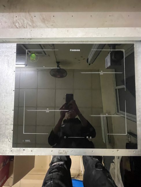 ảnh thực tế sửa chữa thay mặt kính bếp từ nodor tại tp hcm