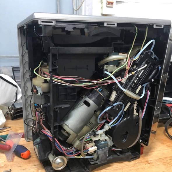 sửa máy pha cà phê delonghi lỗi bình cối ép