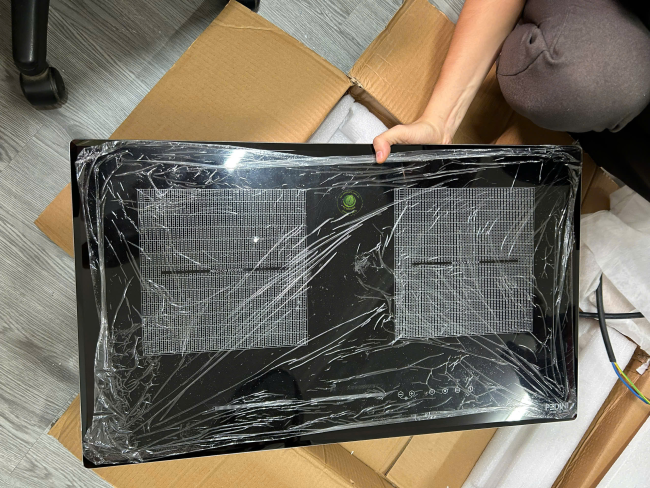 thay mặt kính bếp từ Koenic chính hãng