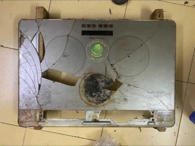 thay mặt kính bếp từ Panasonic