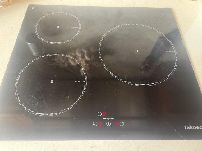 thay mặt kính bếp từ falmec chính hãng