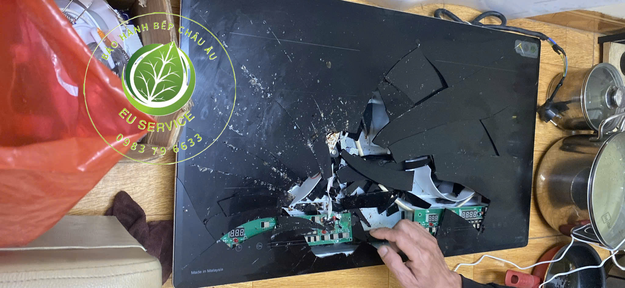 thay mặt kính bếp từ uber